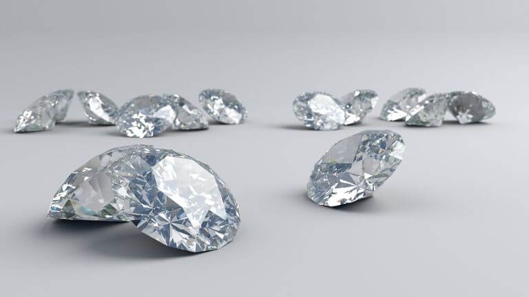 Thirteen sparkling white diamonds for an article about luxury accessories and beauty care products