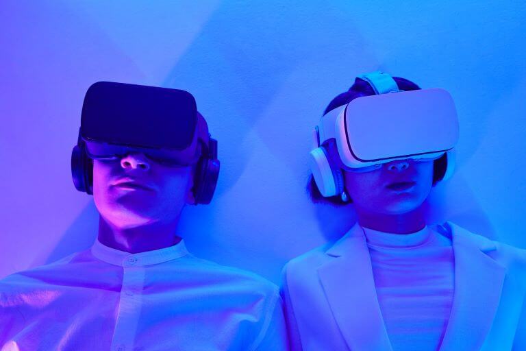Couple with VR headset for trend article about how food, beverage, and beauty brands are joining the metaverse