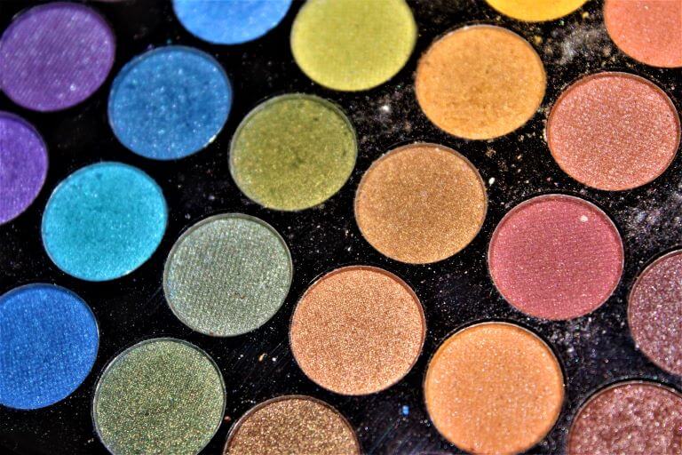 Colorful eyeshadows for trend article about scented cosmetics collaborations with iconic food and beverage brands