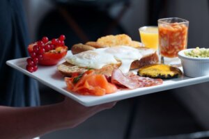 In-Flight Meal Tray with Breakfast for trend article about airlines upping their food and beverage service for premium experiences