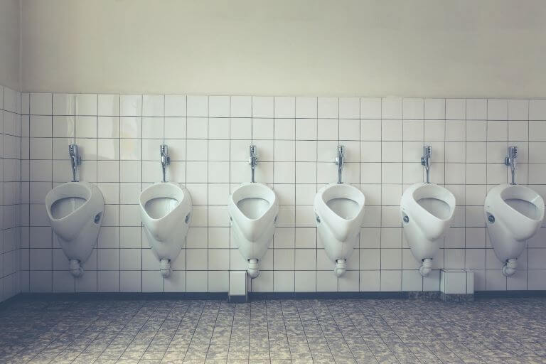 A Row Of Urinals for a trend article about urine being used as a ingredient in the creations of cpgs